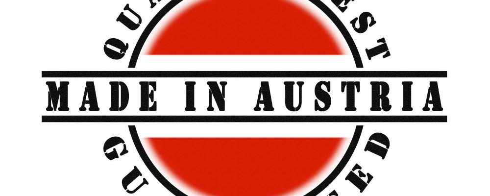 runde österreich-flagge mit Qualitätszeichen